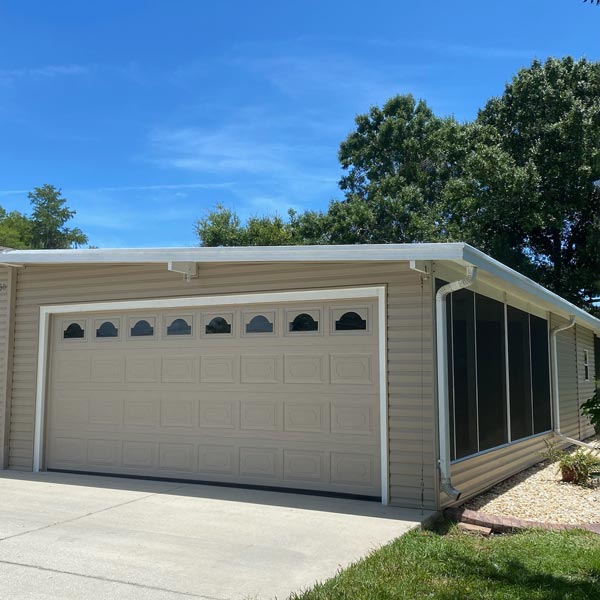 new garage installation with screened windows