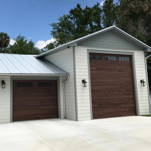 new tall garage door and standard size garage door